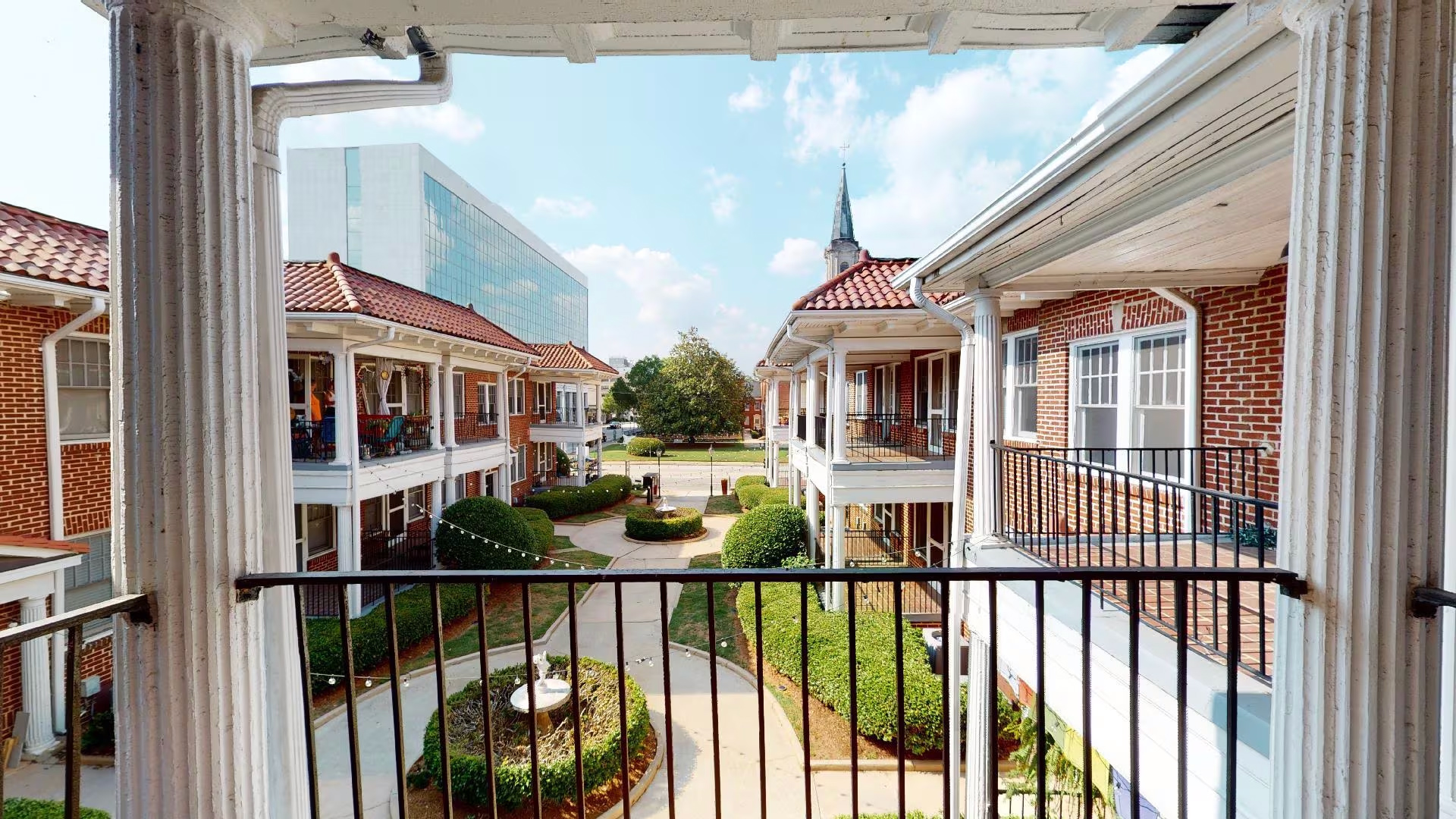 Outdoor balcony overlooking the neighborhood at Candler Commons, located in Decatur, Georgia